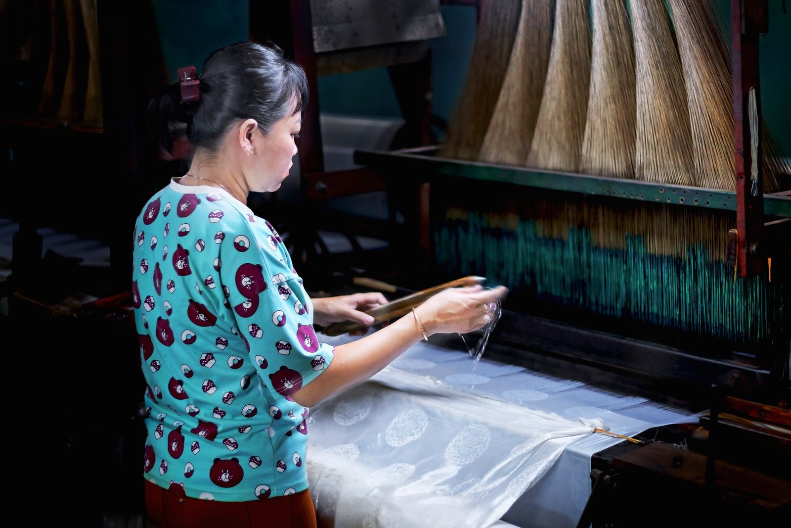 Silk weaving on a traditional loom